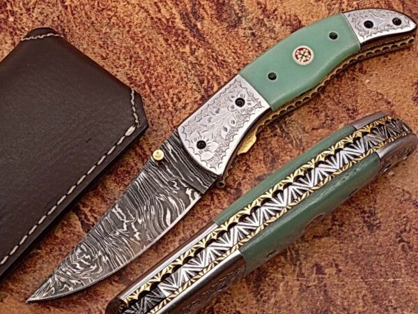 Magnum Trailmaster Damascus Folding Knife ENGRAVED Steel Bolster Composite Grip